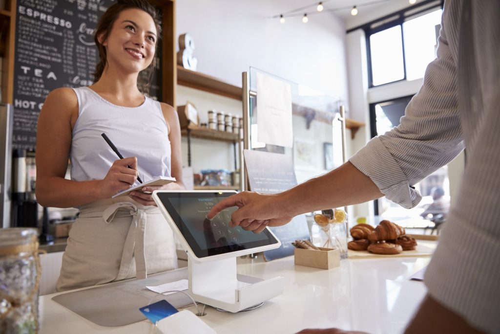 waitress taking order in cafe